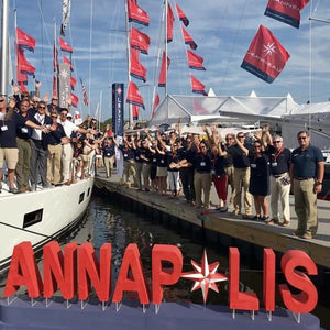 Custom red foam letters spelling Annapolis float on a waterfront, accented with a nautical compass design in the center. These lightweight, durable foam letters are ideal for branding at maritime events, boat shows, and outdoor gatherings. Designed to grab attention, they create a memorable focal point for event promotions and photo opportunities.