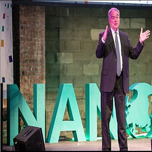 Large custom teal foam letters spelling NANO are prominently displayed on stage. These lightweight, durable, and visually striking letters are ideal for branding at events, conferences, and presentations, they enhance visibility and leave a lasting impression.